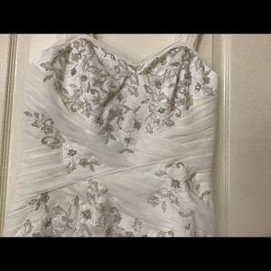Ivory Wedding dress. Detail a Taupe color. Fitted bodice. For a petite bride.
